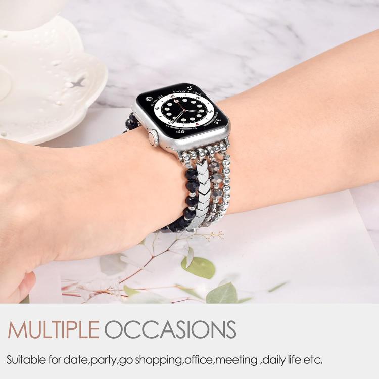 Apple Watch with a black, gray and silver crystal-bead band on a wrist