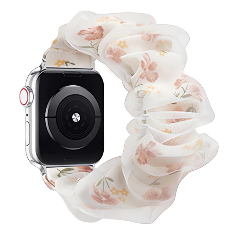 Apple Watch band with a sheer ruffled organza layer and soft pink floral print