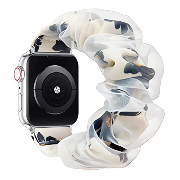 Ruffled organza Apple Watch band with a white base and dark abstract print
