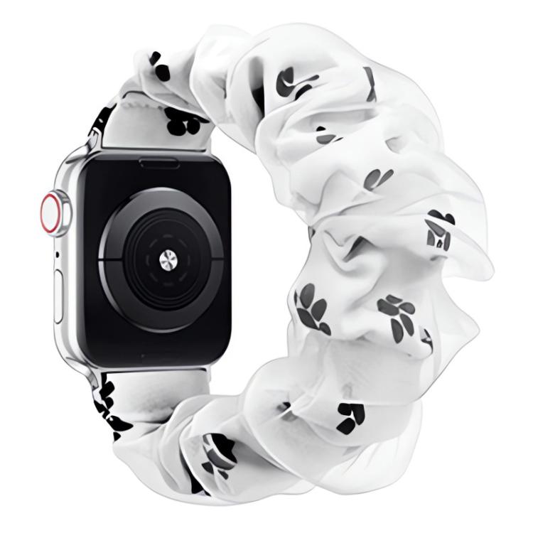 Ruffled organza Apple Watch band with a white base and black floral print