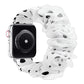Apple Watch band with sheer white ruffles and black irregular spots