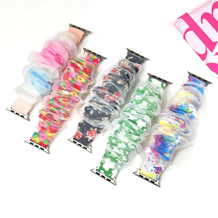 Five sheer ruffled Apple Watch bands in assorted colors and prints