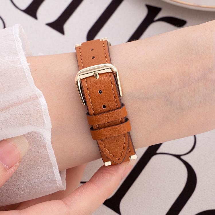 xDfind hybrid leather watch band worn on wrist, showing brown strap, stitching and gold-tone buckle