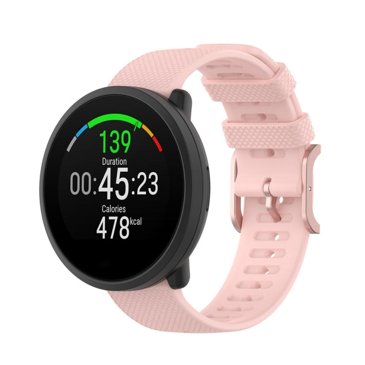 Dot-textured silicone watch strap in light pink with metal buckle and holes