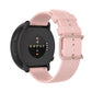 Dot-textured silicone watch strap in light pink with watch clasp and pin holes