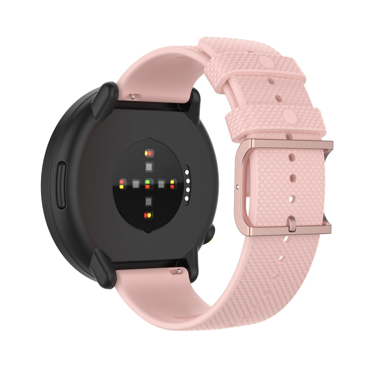 Dot-textured silicone watch strap in light pink with watch clasp and pin holes