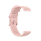 Light pink dot-textured silicone watch band with buckle and strap notches