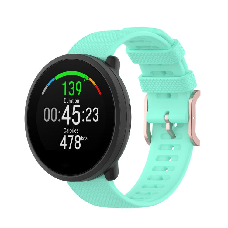 Dot-textured silicone watch strap in mint green with adjustable buckle and holes