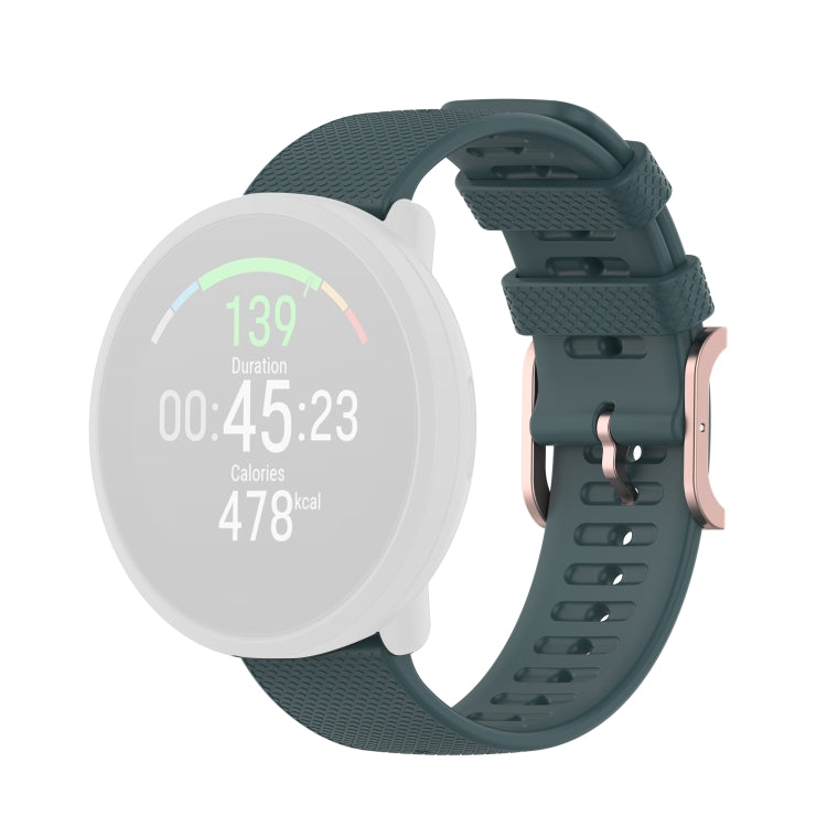 Dot-textured silicone watch strap in dark green with adjustable buckle and holes
