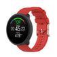 Dot-textured silicone watch strap in red, with adjustable buckle holes