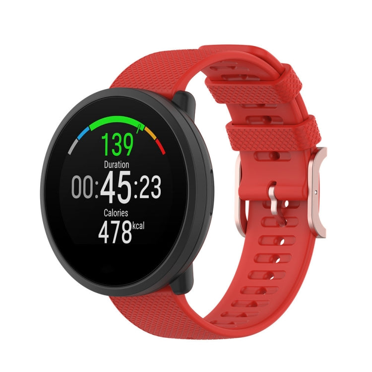 Dot-textured silicone watch strap in red, with adjustable buckle holes