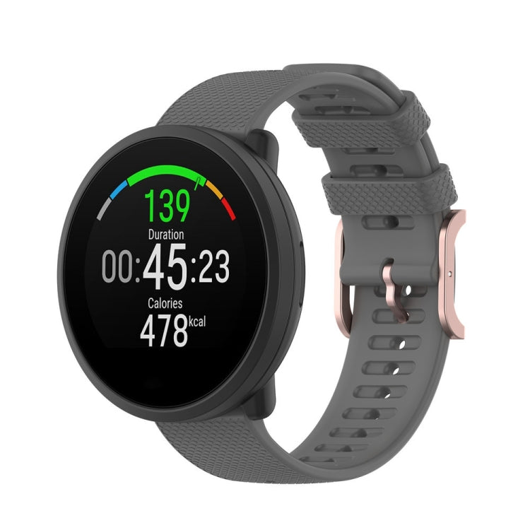 Dot-textured silicone watch strap in gray, with adjustable buckle holes