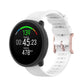 Dot-textured silicone watch strap in white, with adjustable buckle holes