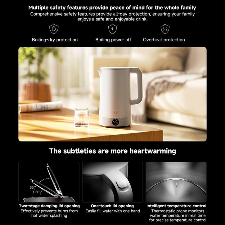White electric kettle on countertop with handle and spout, ready to pour