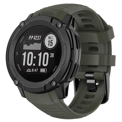 Dark green silicone watch band fitted to a rugged round smartwatch