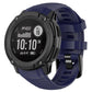 Navy blue silicone watch band fitted to a rugged round smartwatch