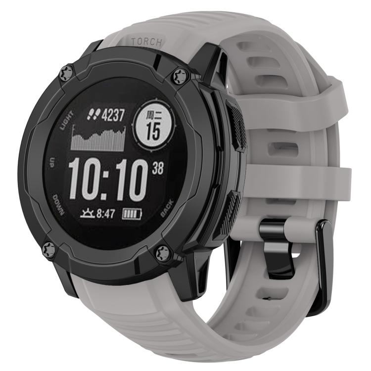 Gray silicone watch band fitted to a rugged round smartwatch