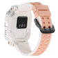 Back view of a kids' smartwatch with a white and peach perforated band