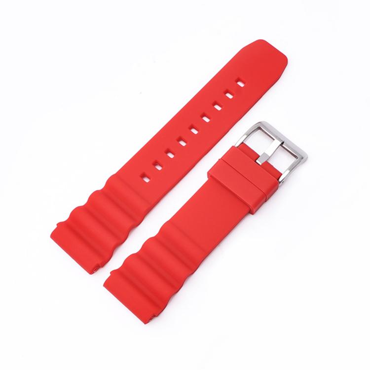 Red silicone watch band with adjustment holes and silver buckle