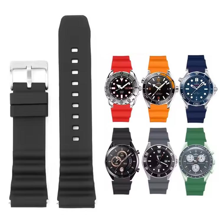 Black silicone watch band beside watches showing available band colors