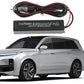 Amplified AM/FM radio antenna module installed on car with wiring harness