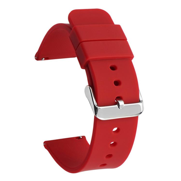Red silicone watch band with a silver pin buckle and adjustment holes