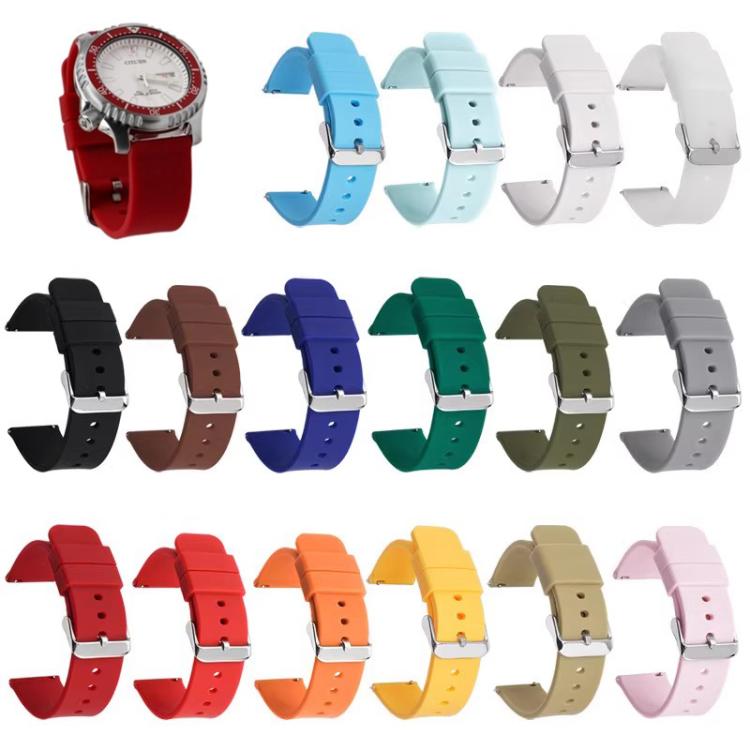 Silicone watch bands in assorted colors with silver buckles; one red band is attached to a watch