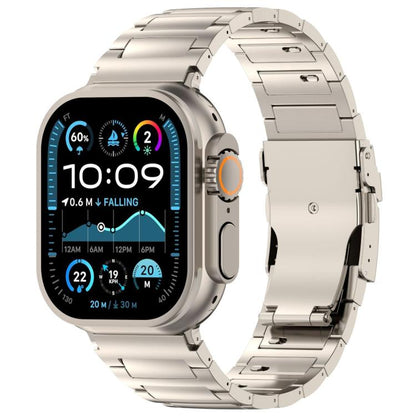 Titanium-tone metal link Apple Watch band with quick-release clasp, shown on a smartwatch