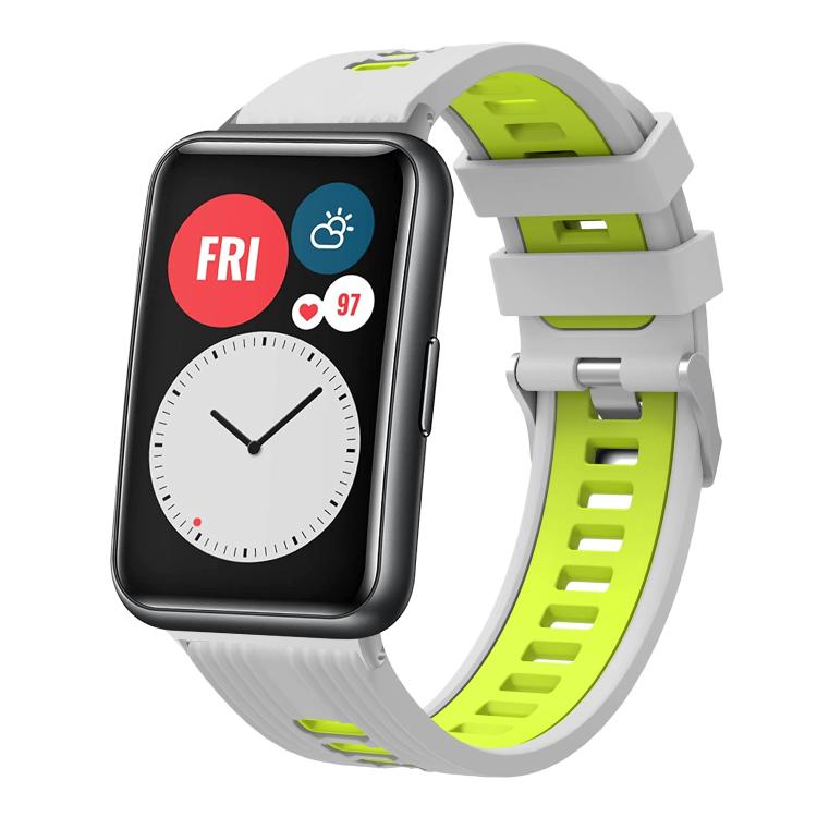 White and lime green silicone watch band with silver buckle on a smartwatch
