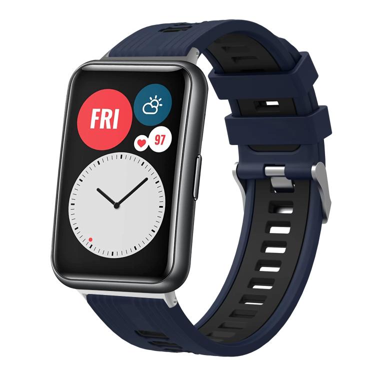 Navy and black silicone watch band with silver buckle on a smartwatch