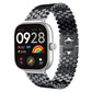 Black fish-scale metal watch band shown on a square smartwatch