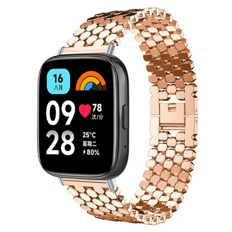 Rose gold fish-scale metal watch band shown on a rectangular smartwatch