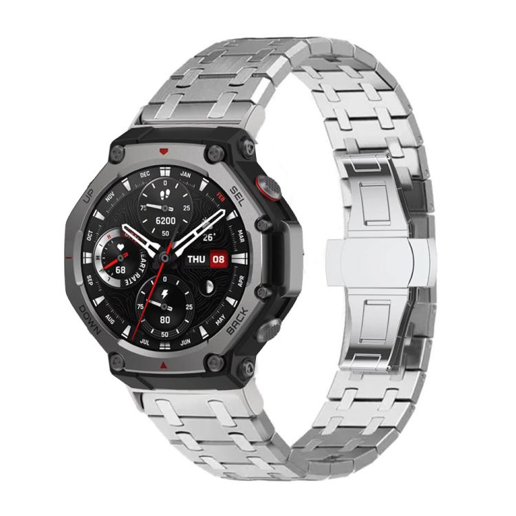 Silver titanium alloy watch band with butterfly clasp, fitted to a rugged smartwatch.