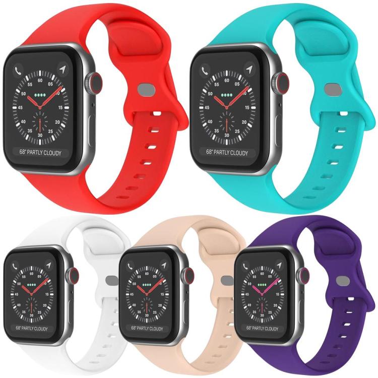 Five silicone Apple Watch bands in red, turquoise, white, beige, and purple.