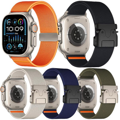 Five stretch nylon Apple Watch bands in orange, black, starlight, navy, and olive green.