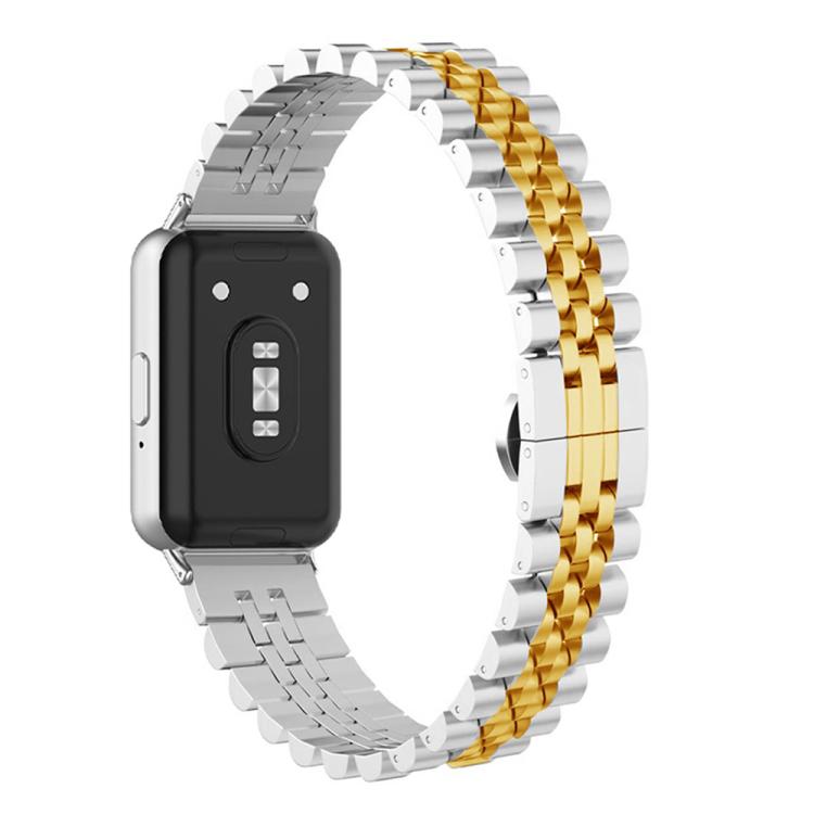 Silver and gold stainless steel watch band attached to a smartwatch