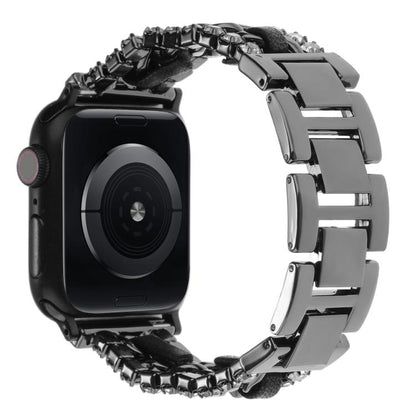 Black Apple Watch band with wide polished metal links and chain detailing