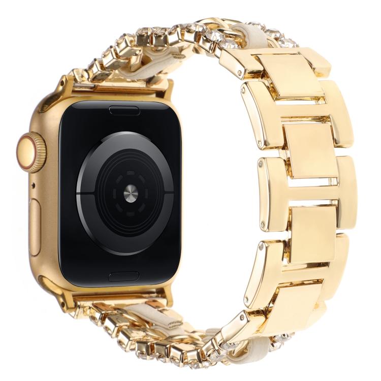 Gold metal Apple Watch band with pale inserts and crystal-like edge details