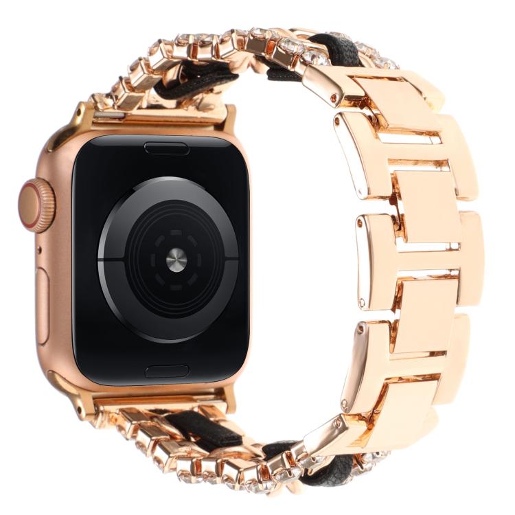 Rose gold metal Apple Watch band with black inserts and crystal-like edge details