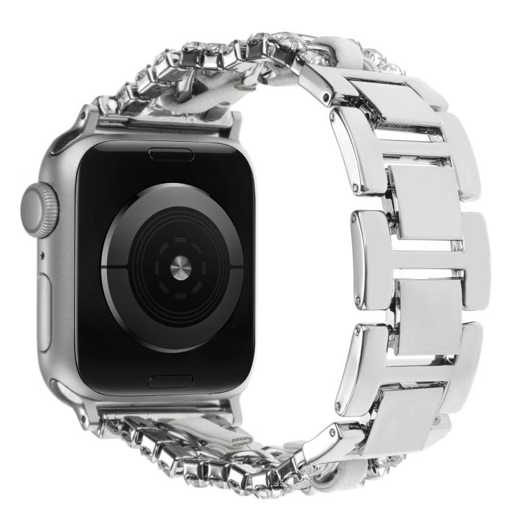 Silver metal Apple Watch band with pale inserts and crystal-like edge details