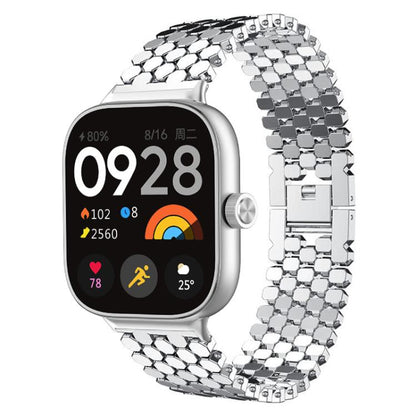 Silver stainless steel watch band with fish-scale links, shown on a smartwatch