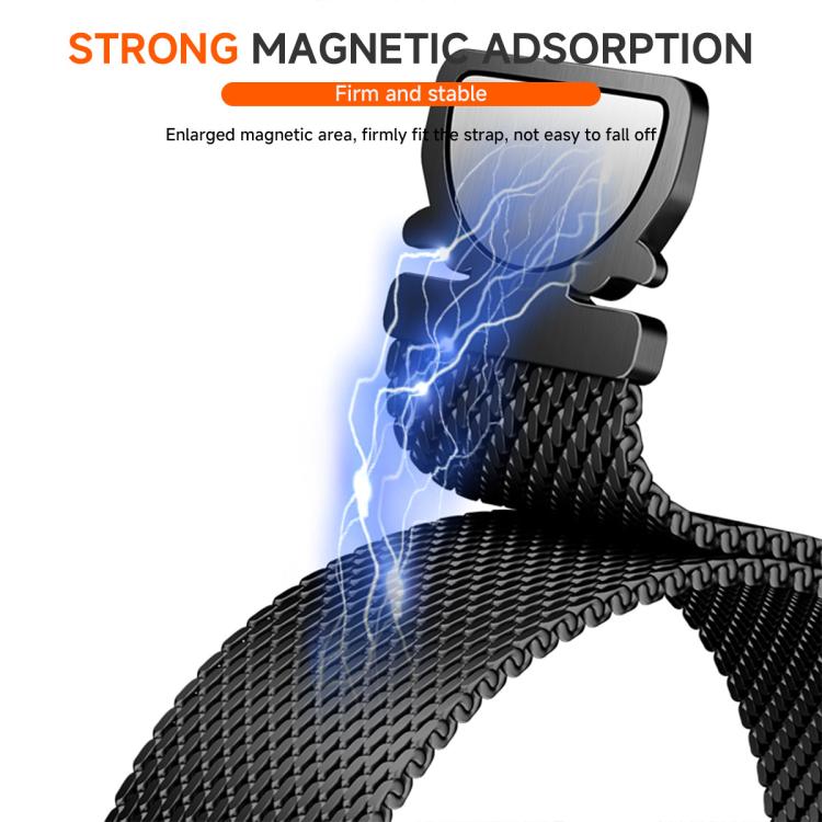 Close-up of the black mesh watch band attaching to its magnetic clasp
