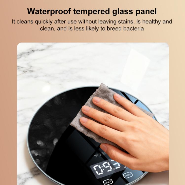 Round black electronic kitchen scale with tempered glass panel and wipe-clean surface