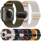Elastic nylon magnetic watch bands in assorted colors, including green, orange, black and blue