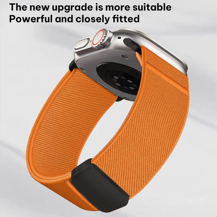 Orange elastic nylon watch band with black connector attached to a smartwatch