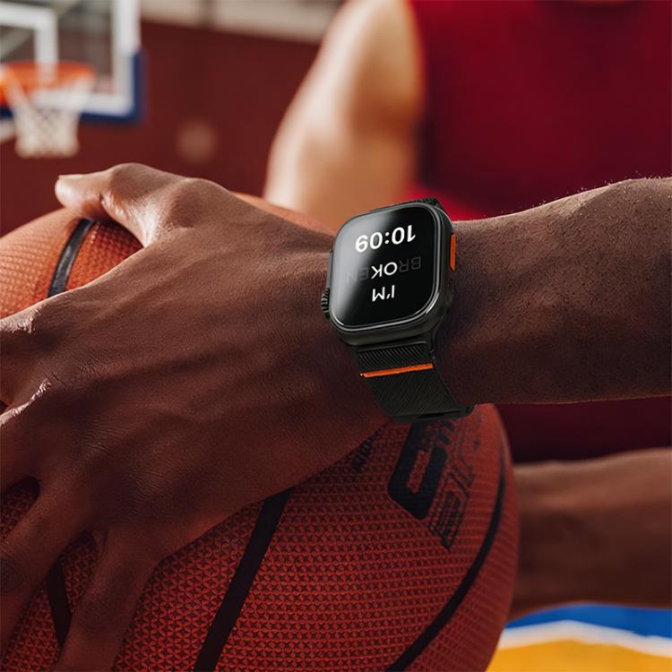 Black watch band with orange accent worn on a smartwatch