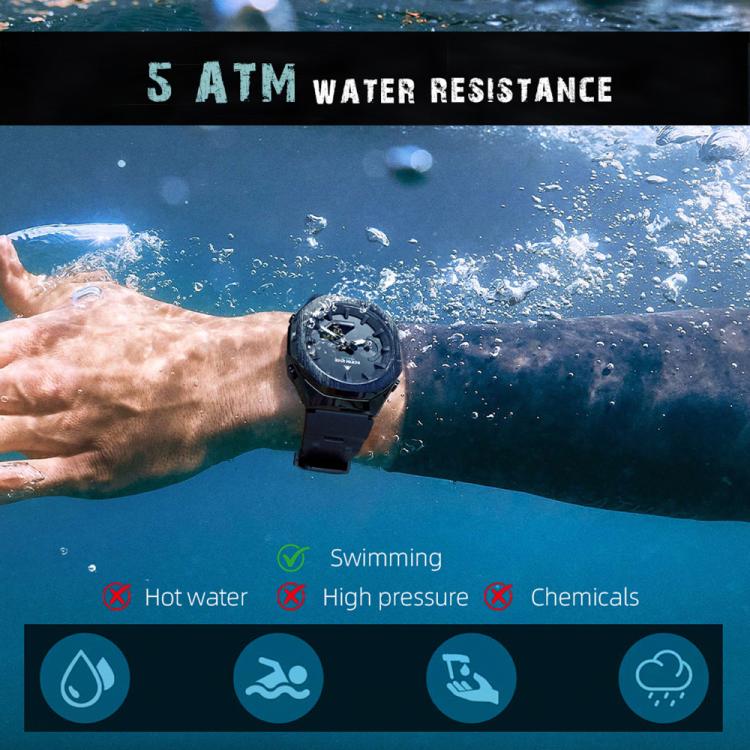 Black electronic sports watch on wrist, round dark dial and black silicone strap