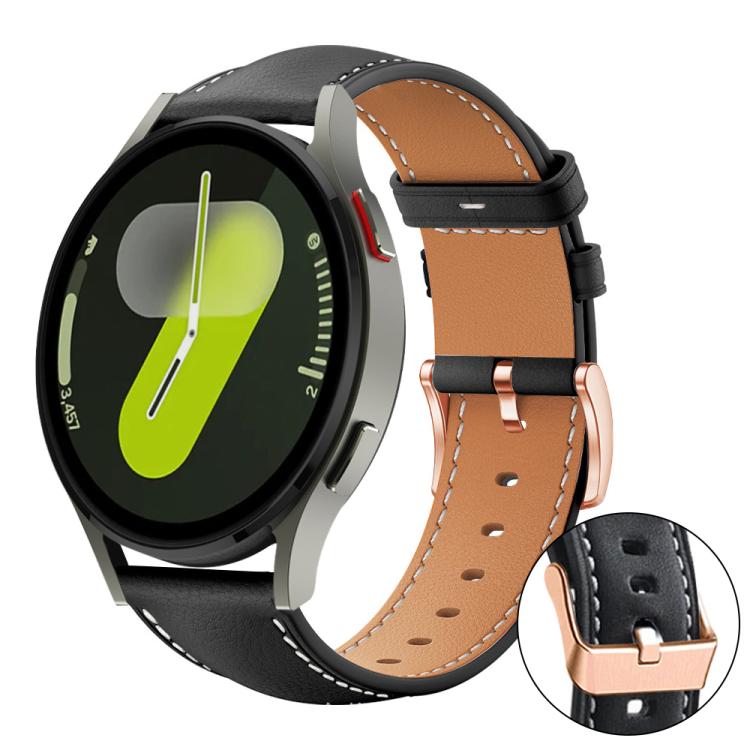 Watch band with black outer strap, tan lining, and rose gold buckle