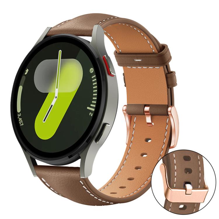 Watch band with brown outer strap, tan lining, and rose gold buckle