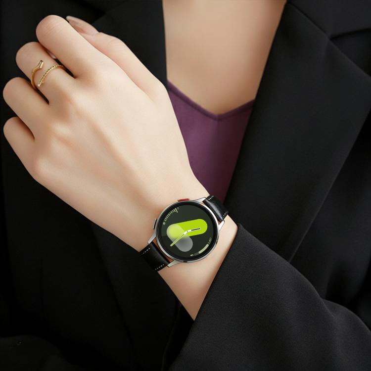 Smartwatch with a black vegan leather band and rose gold buckle worn on a wrist